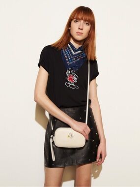 Coach X Mickey Crossbody Clutch
In Glovetanned Leather
